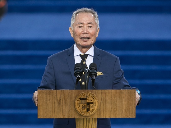 FILE - In this Saturday, July 1, 2017, file photo, actor George Takei introduces Los Angeles Mayor Eric Garcetti at a swearing-in ceremony at Los Angeles City Hall. Takei is scheduled to speak Tuesday, May 8, 2018, at the Boston Public Library to discuss his experience during World War II spent in U.S. internment camps for Japanese-Americans. (AP Photo/Damian Dovarganes, File)