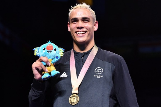 (FILES) This file photo taken on April 14, 2018 shows New Zealands David Nyika smiling after receiving his gold medal during the medal ceremony for the mens 91kg boxing event during the 2018 Gold Coast Commonwealth Games at the Oxenford Studios venue on the Gold Coast. Nyika appealed on May 14, 2018 for the return of the heavyweight gold medal he won at last months Commonwealth Games after it was stolen from his car in Auckland. Anthony Wallace/AFP