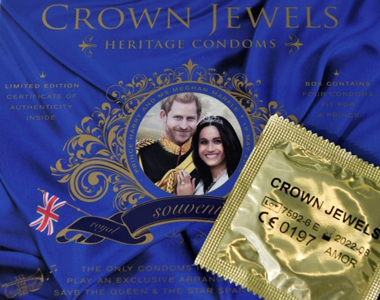 (FILES) In this file photo taken on May 10, 2018, a picture arranged as an illustration shows a box of Crown Jewels condoms limited edition unofficial Royal Wedding souvenir box celebrating the upcoming nuptuals of Britains Prince Harry and his finacee US actress Meghan Markle, photographed in London. The highly-anticipated marriage between Britains Prince Harry and US actress Meghan Markle in Windsor on May 19 has generated a slew of quirky side-stories and offbeat tributes. Daniel Sorabji/AFP