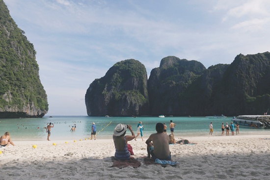 Tourists pass their time as they visit Maya Bay in Krabi province, Thailand May 23, 2018. REUTERS/Soe Zeya Tun