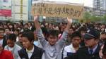 มังกรสยบการชุมนุมหน้าคาร์ฟูร์ หวั่นมลพิษบรรยากาศโอลิมปิก