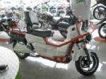 Electric motorcycles suggested to cope with global warming