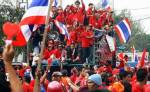 Red shirts march to Government House