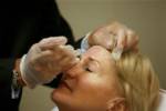 Plastic surgery popular despite economic woes: poll
