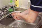 Is the person next to you washing with soap?