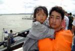 Indonesian ferry captain blames storm as search resumes