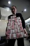 จีนประสบปัญหาพิมพ์ธนบัตรหยวนไม่ทัน