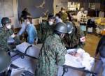 Man rescued from rubble eight days after Japan quake