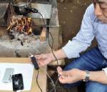 Japan gadget charges cellphone over campfire