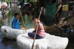Angry Bangkok residents damage major floodwall