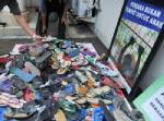 Indonesians dump sandals over child rights