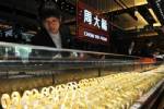 Commodities mostly climb on improving economic outlook