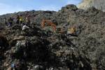 Four missing in Philippine trash avalanche