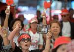 Thai "red shirts" prepare rally to back PM against protesters