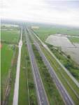 สผ.ไฟเขียวผล EIA รถไฟทางคู่-มอเตอร์เวย์ รับเหมาคึกคัก “คมนาคม” คาดเริ่มประมูลต้นปี 58