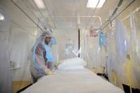 Spanish missionary with Ebola lands in Madrid