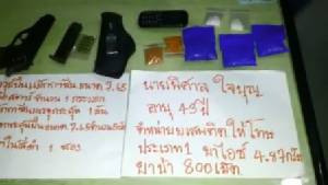 ตร.บางบัวทอง จับผู้ต้องหาค้ายาบ้าพร้อมอาวุธปืน