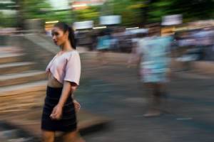 Models strut in Rio streets after fashion week fail