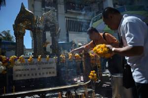 Youngest victim wounded by Bangkok bomb flies home to Hong Kong