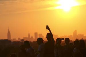 New York, Washington bask in warm winter weather records
