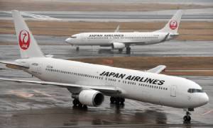 Cabin smoke forces Japan Airlines evacuation in snowstorm