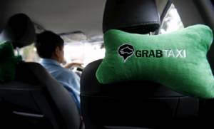 แท็กซี่เจ้าถิ่นในเวียดนามโอด Uber, Grab ทำกำไรหดหาย