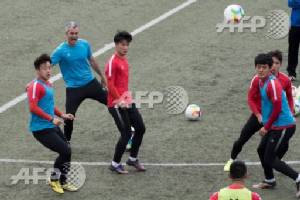 Pork, sweets off menu for 'fat' Chinese footballers as Spanish take charge