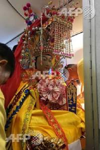 Chinese deities fly business class for SE Asia tour