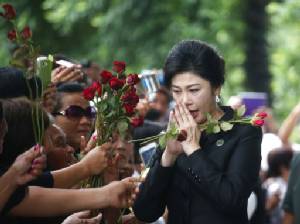Thai ex-prime minister vows to fight negligence charge