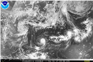 Typhoon weakens but could still threaten Japan