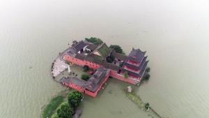 12 เมืองในอันฮุยประกาศ ‘ฉุกเฉินน้ำท่วม’ หลังฝนตกหนักต่อเนื่อง