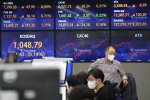 ตลาดหุ้นเอเชียผันผวนหลังดาวโจนส์ร่วง-นักลงทุนวิตกโควิด-19