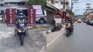 นึกว่าร้านทาโกะยากิ ตำรวจสายตรวจมือไม่ว่าง นั่งซ้อนท้ายมอเตอร์ไซค์ถือธงญี่ปุ่น