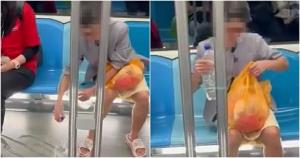 สบายๆ เหมือนอยู่บ้าน! มนุษย์ป้าเทน้ำล้างมือบนขบวนรถไฟฟ้าหน้าตาเฉย (ชมคลิป)